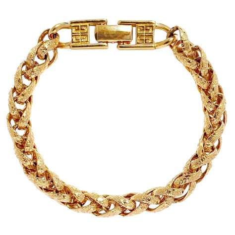 vintage givenchy hinged twisted bracelet|vintage givenchy gold chain necklace.